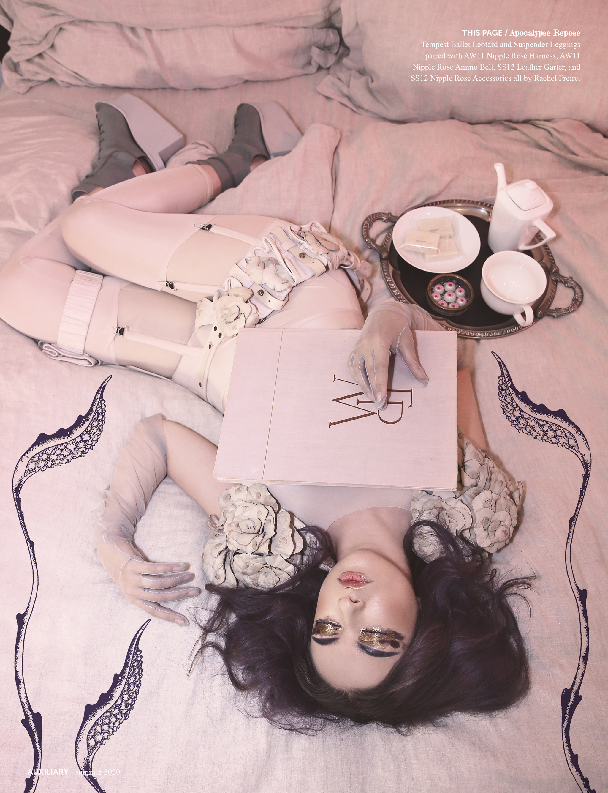 Zoetica Ebb dreaming with books and tea, wearing Rachel Freire for Auxiliary magazine.